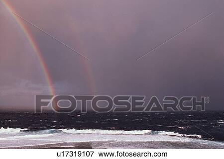 Stock Photo - Rainbow Over Sea. Fotosearch