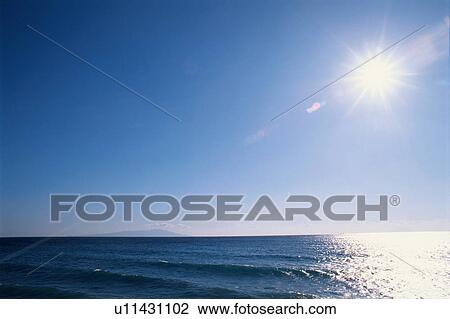 Stock Image - Sun Reflected On Ocean. Fotosearch