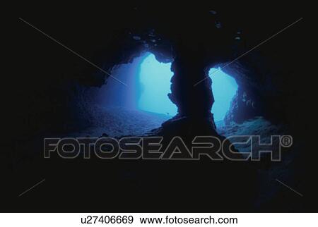 Stock Photo - An Underwater Cave With A Pillar. Fotosearch