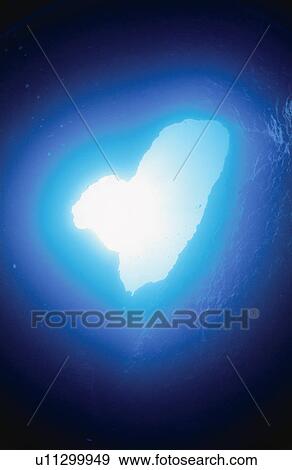 Stock Photo - The Underwater Cave Of A Heart Shape. Fotosearch