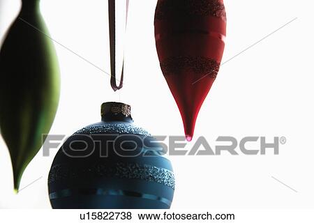Stock Photo - Baubles hanging (close-up). Fotosearch