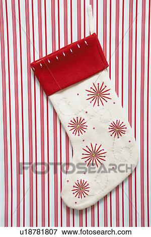 Christmas decoration on stripy wall paper View Large Photo Image Stock Photo - Christmas decoration on stripy wall paper. Fotosearch