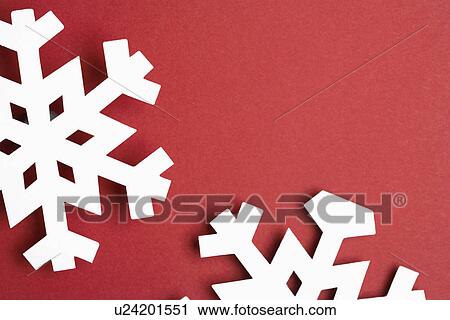Paper snowflakes on red background (close-up) View Large Photo Image Stock Image - Paper snowflakes on red background (close-up). Fotosearch