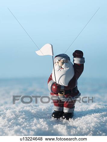 Santa Claus Figurine in Snow View Large Photo Image Stock Photo - Santa Claus Figurine in Snow. Fotosearch