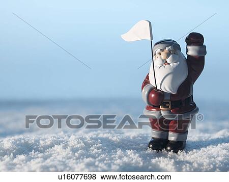Santa Claus Figurine in Snow View Large Photo Image Stock Photo - Santa Claus Figurine in Snow. Fotosearch