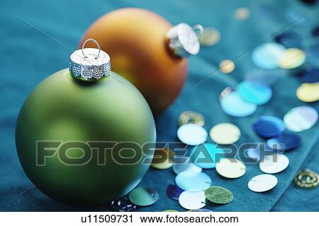 Two baubles with glitter (close-up) View Large Photo Image Stock Image - Two baubles with glitter (close-up). Fotosearch