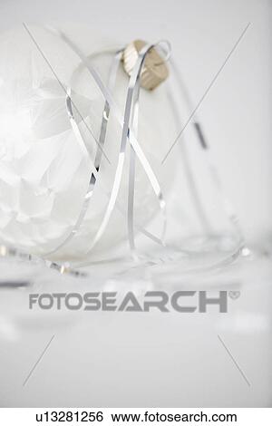 Stock Photograph - White bauble (close-up). Fotosearch