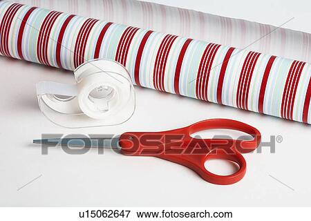 Stock Photo - Wrapping paper, adhesive tape and scissors. Fotosearch