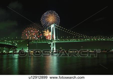 Stock Photo - Fireworks And Rainbow Bridge. Fotosearch