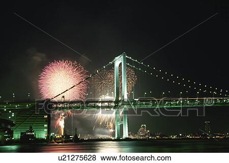 Stock Photo - Rainbow Bridge And Fireworks. Fotosearch