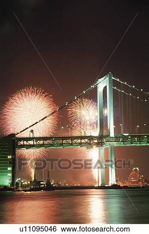 Stock Photograph - Rainbow Bridge And Fireworks. Fotosearch
