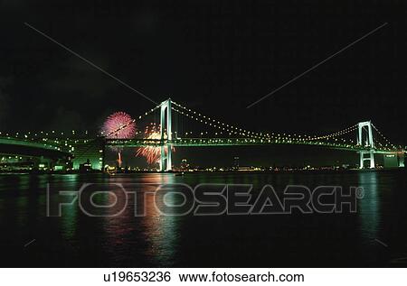 Stock Photograph - Rainbow Bridge And Fireworks. Fotosearch