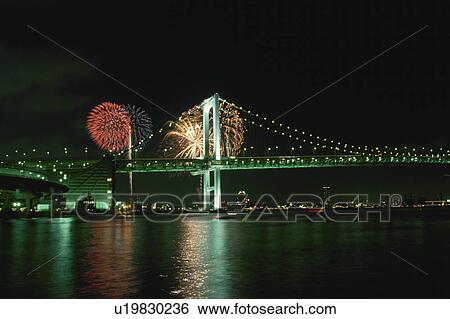 Stock Photograph - Rainbow Bridge And Fireworks. Fotosearch