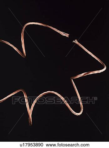 Stock Image - Two copper wires (close-up). Fotosearch