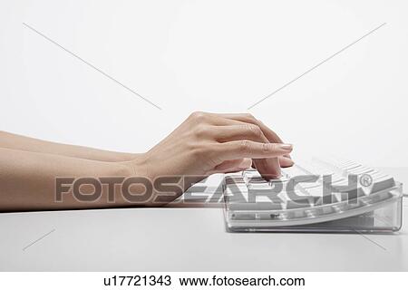 Young woman typing with computer (close-up) View Large Photo Image Stock Image - Young woman typing with computer (close-up). Fotosearch