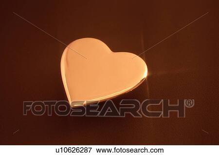 Stock Photo - Golden Love Heart. Fotosearch