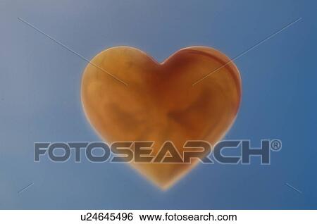 Stock Photograph - Orange Love Heart. Fotosearch