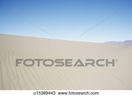 Stock Image - Empty highway in desert, Death Valley, California, USA. Fotosearch