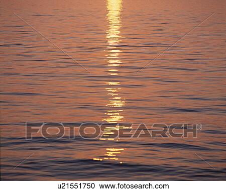 Stock Image - Sunlight Reflected On Water. Fotosearch