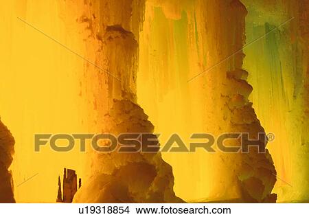 Ice Formations In Yellow Light View Large Photo Image Picture - Ice Formations In Yellow Light. Fotosearch