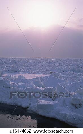 Stock Image - Drift Ice And The Morning Sun. Fotosearch