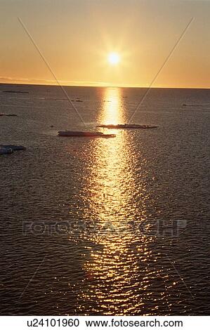 Stock Image - Sunset Over Ocean. Fotosearch