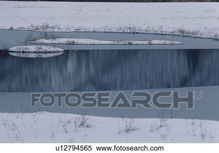 Reflections On Frozen Pond View Large Photo Image Stock Photography - Reflections On Frozen Pond. Fotosearch