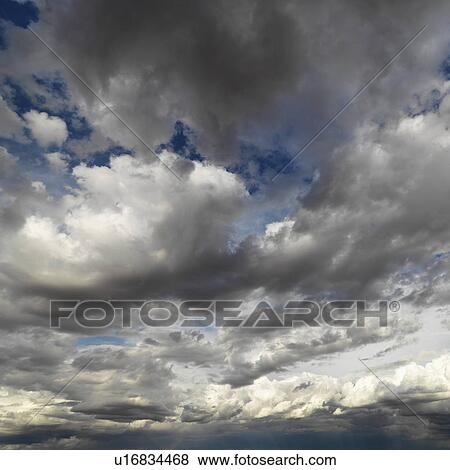 Stock Photo - Cloud formations in sky.. Fotosearch