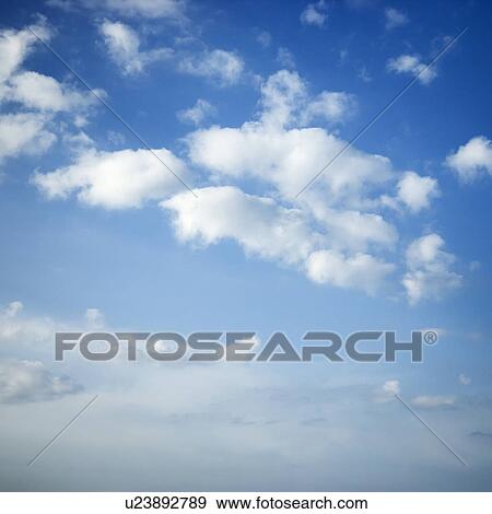 Cumulus clouds in blue sky View Large Photo Image Stock Photo - Cumulus clouds in blue sky. Fotosearch