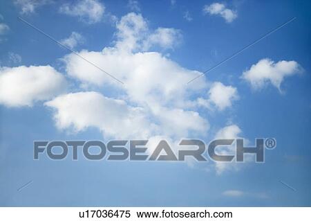 Cumulus clouds in blue sky View Large Photo Image Stock Photography - Cumulus clouds in blue sky. Fotosearch