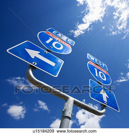 Highway interstate 10 sign with arrows showing direction. View Large Photo Image Stock Photo - Highway interstate 10 sign with arrows showing direction.. Fotosearch