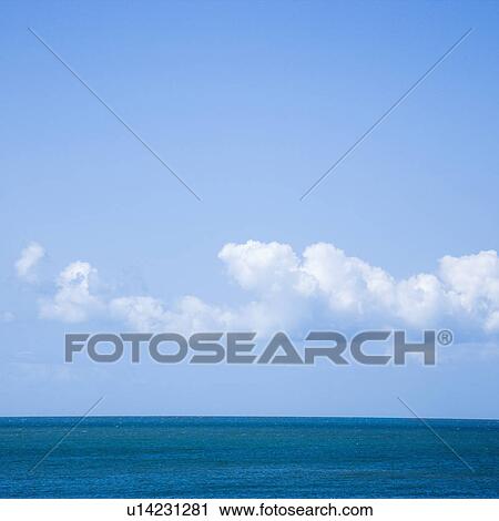 Ocean and sky with low cumulus clouds. View Large Photo Image Stock Image - Ocean and sky with low cumulus clouds.. Fotosearch
