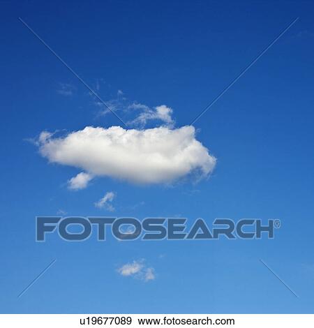 Stock Photo - Single fluffy cloud in blue sky.. Fotosearch