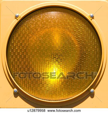 Closeup of yellow traffic stoplight View Large Photo Image Stock Photo - Closeup of yellow traffic stoplight. Fotosearch