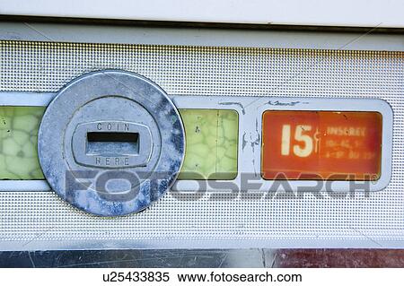 Stock Photography - Coin slot and 15 cent price on old vending machine. Fotosearch