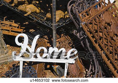 Metal garden decoration of word Home next to rusted metal objects View Large Photo Image Stock Image - Metal garden decoration of word Home next to rusted metal objects. Fotosearch
