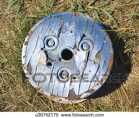 Old round wooden cog lying on ground. View Large Photo Image Stock Photography - Old round wooden cog lying on ground.. Fotosearch