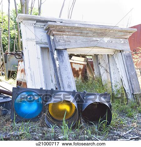 Stock Photo - Old traffic light on ground in junkyard.. Fotosearch