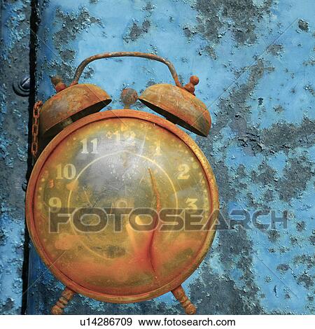 Stock Photo - Old weathered alarm clock against rusty blue metal background. Fotosearch