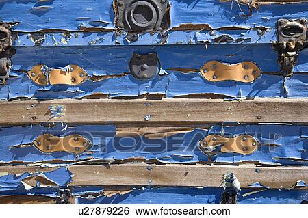 Peeling blue paint on old storage trunk. View Large Photo Image Stock Photograph - Peeling blue paint on old storage trunk.. Fotosearch