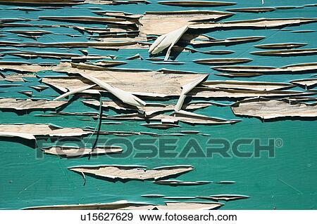 Stock Photo - Side of wall with green peeling paint.. Fotosearch