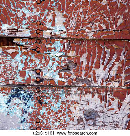 Stock Image - Side of wall with peeling paint.. Fotosearch