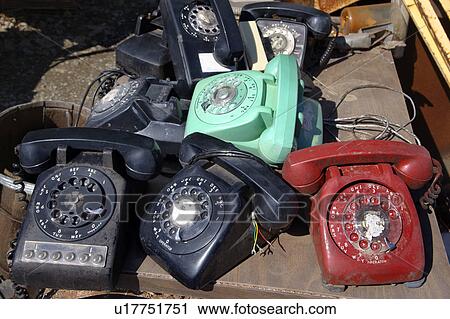 Stack of old broken rotary telephones on table. View Large Photo Image Stock Image - Stack of old broken rotary telephones on table.. Fotosearch