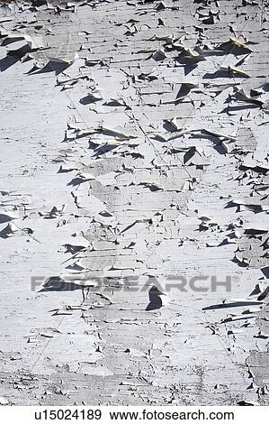 Stock Photo - White peeling paint on old wall.. Fotosearch