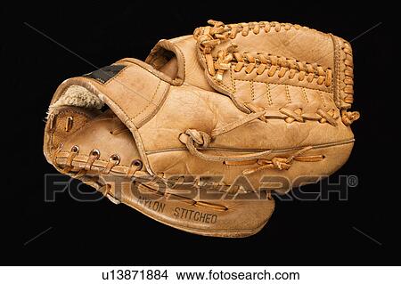 Picture - Baseball glove on black. Fotosearch