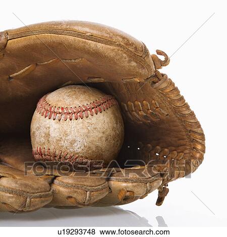 Baseball resting in baseball glove. View Large Photo Image Stock Photo - Baseball resting in baseball glove.. Fotosearch