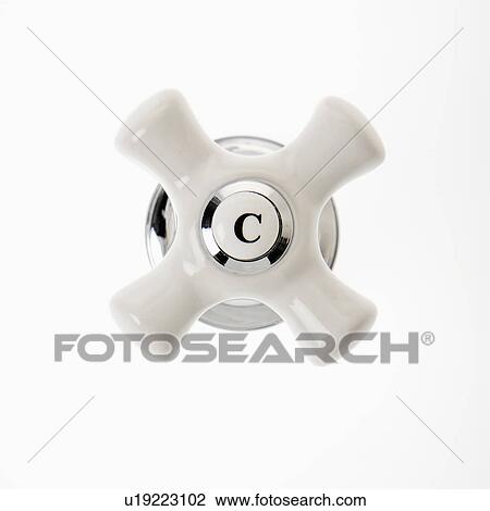 Stock Image - Cold faucet handle against white background. Fotosearch