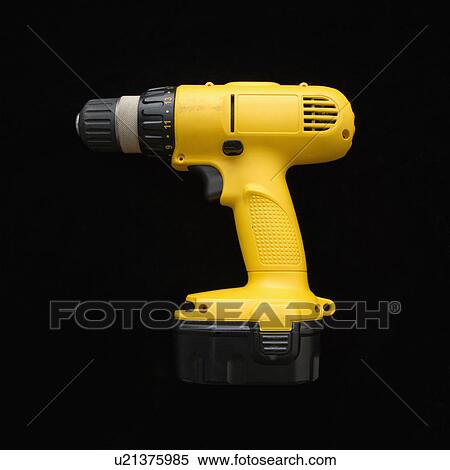 Cordless rechargeable electric drill View Large Photo Image Stock Photography - Cordless rechargeable electric drill. Fotosearch