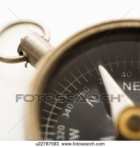 Stock Image - Detail of compass pointing northeast. Fotosearch