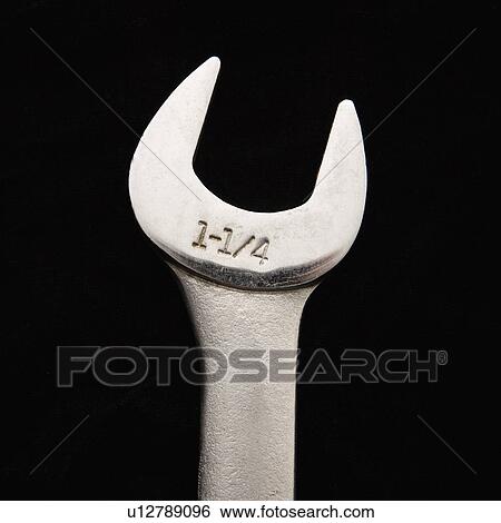 Stock Photograph - Detail of metal crescent wrench. Fotosearch